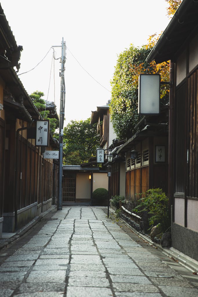 Quaint alleyway in Kyoto showcasing traditional architecture and cultural heritage.